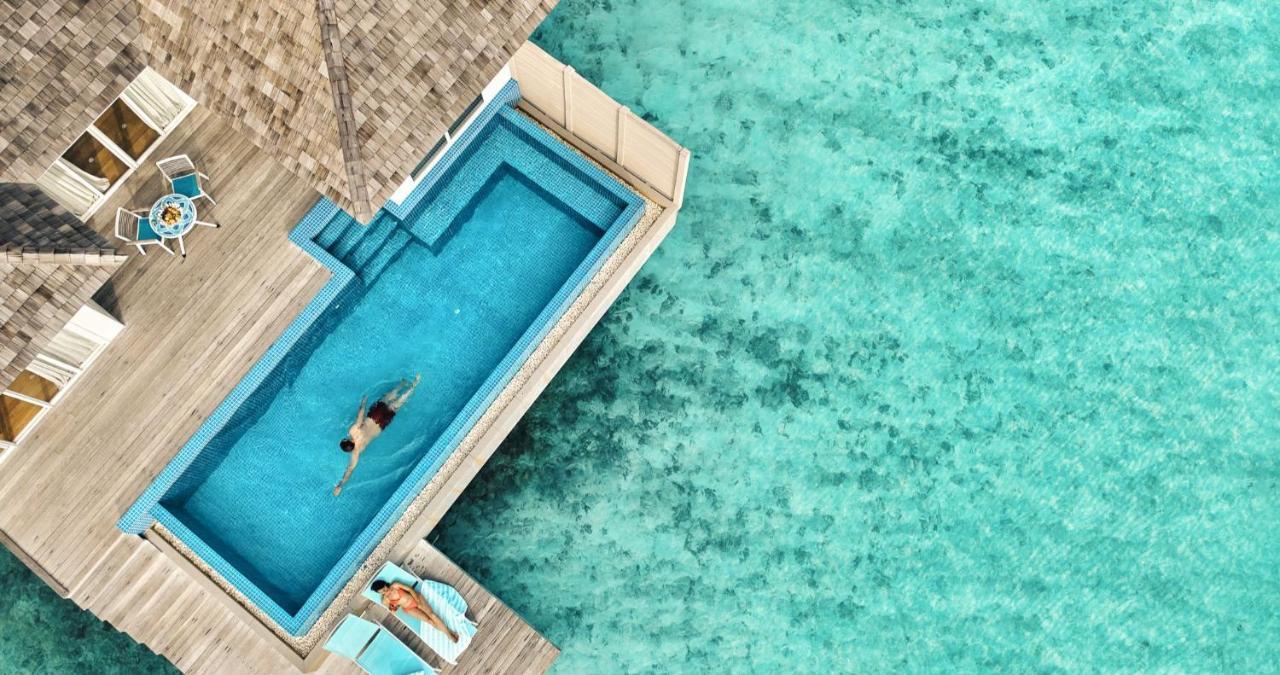 Kandima Maldives Kudahuvadhoo Ngoại thất bức ảnh Aerial view of a pool at a resort in Maldives