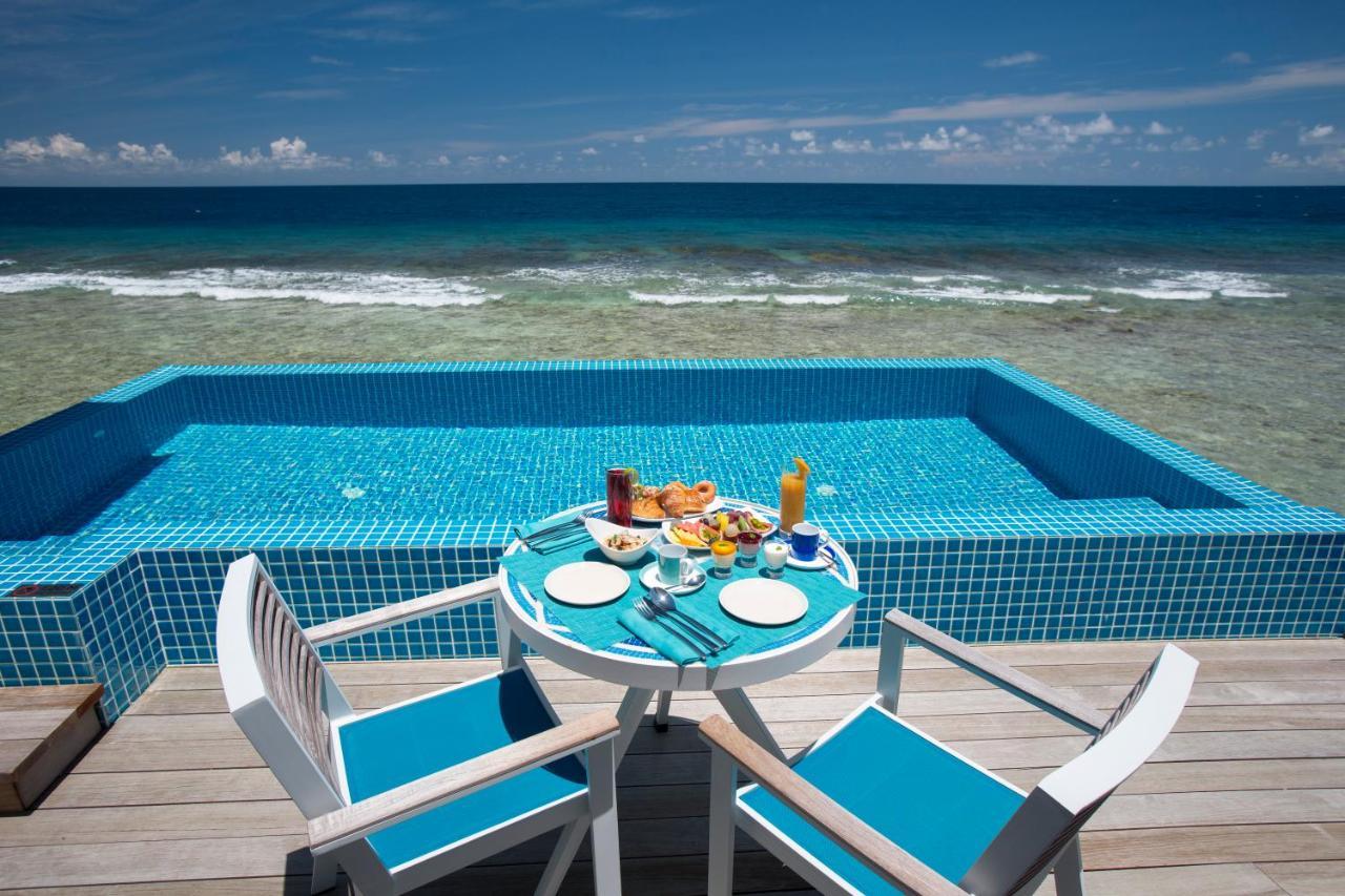 Kandima Maldives Kudahuvadhoo Ngoại thất bức ảnh A pool at a resort in Maldives